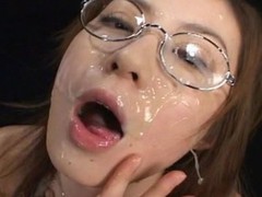 Kokoro Amano sucked dicks and took 150 bukkake cumshots on her face and in her face aperture  ate cum on food and collected cum in a bottle and drank it all down.