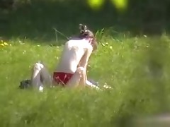 A creeper in the bushes catches a nude couple fucking in the park with his cam. Their nude bodies get it on and have a fun their sex without a care in the world or the slightest suspicion that anybody may be lurking.