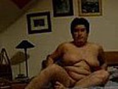 Well here's one more corpulent mature mama taping herself during a masturbation session in this movie scene clip. She fingers her pussy with as many fingers as she needs while showing off her heavy saggy mounds